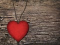 Red paper heart on a string on the wooden background Royalty Free Stock Photo