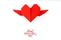 Red paper origami heart with wings on white background . Royalty Free Stock Photo