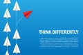 Red paper plane arrow changing direction. isolated on blue background. Different thinking concepts. The road to success.