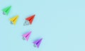 Red paper plane move out and leading from colorful another plane for leadership concept by 3d rendering Royalty Free Stock Photo