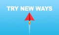 Red paper plane or rocket with business message Try new ways!