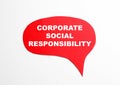 Red paper sheet with words Corporate Social responsibility on white background, top view Royalty Free Stock Photo