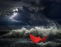 Red paper ship in storm concept Royalty Free Stock Photo