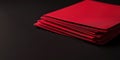 Red paper stack on black background with clean folded edges Royalty Free Stock Photo