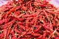 Red paprica in traditional vegetable market in India, Puttaparthi, Andhra Pradesh. Close-up.