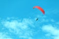Red paraglider on the blue Sky Royalty Free Stock Photo