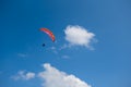 Paraglider fly among a blue sky Royalty Free Stock Photo