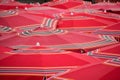 Red parasols in the market place