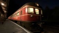Red Passenger Train at Night Station Platform Royalty Free Stock Photo