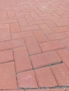 Red paving block or conblock floor. Side view diagonal alignment.?