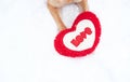 Red Paws Of German Shepherd In The Snow Next To Red Toy Heart With Inscription - Love. Cute Valentines Day Card With Pet Dog