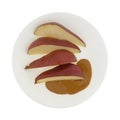 Red pears cut with peanut butter Royalty Free Stock Photo