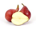 Red pears with one cut in half Royalty Free Stock Photo