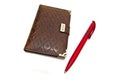 Red pen and notebook Royalty Free Stock Photo