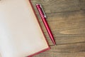 Red pen, red book Royalty Free Stock Photo