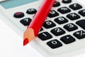 Red pencil and calculator Royalty Free Stock Photo