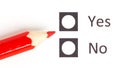 Red pencil choosing between yes or no