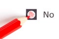 Red pencil choosing between yes or no Royalty Free Stock Photo
