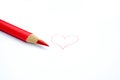 Red pencil crayon and a heart Royalty Free Stock Photo