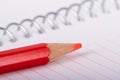 Red Pencil on Notebook Royalty Free Stock Photo