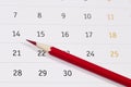 Red pencil over calendar Royalty Free Stock Photo