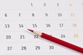 Red pencil over calendar Royalty Free Stock Photo