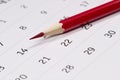 Red pencil over calendar Royalty Free Stock Photo