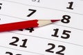 Red pencil over calendar Royalty Free Stock Photo