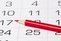 Red pencil over calendar Royalty Free Stock Photo