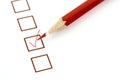 Red pencil and questionnaire on white paper. Royalty Free Stock Photo