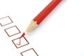 Red pencil and questionnaire on white paper. Royalty Free Stock Photo