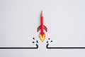Red pencil rocket breaking through black wall obstacle on white background minimal style. Concept of breakthrough for new idea Royalty Free Stock Photo