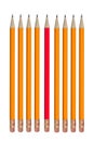 Red Pencil Among Row of Orange Pencils Concept Royalty Free Stock Photo