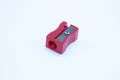 Red pencil sharpener isolated on white background. Royalty Free Stock Photo