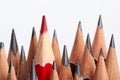 Red pencil standing out from crowd Royalty Free Stock Photo