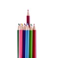 Red pencil stands out of a bunch of colorful pencils Royalty Free Stock Photo