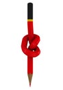 Red pencil tied in a knot Royalty Free Stock Photo