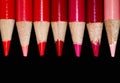 7 Red Pencils - Black Background Royalty Free Stock Photo