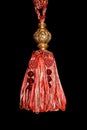 Red pendant on black Royalty Free Stock Photo