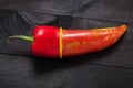 Red pepper on black Royalty Free Stock Photo