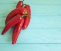 Red pepper on a blue wooden background spice Royalty Free Stock Photo