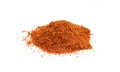 Red pepper powder isolated on white background. Dry and grinded food ingredient Royalty Free Stock Photo