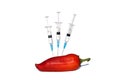 In red pepper pricked with a syringe on a white isolated background.