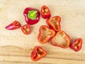 Red pepper sliced on a wooden cutting board Royalty Free Stock Photo