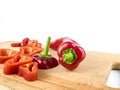 Red pepper sliced on a wooden cutting board Royalty Free Stock Photo