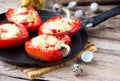 Red pepper stuffed with pasta and cheese on old