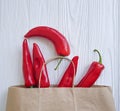 red pepper on a white wooden paper bag Royalty Free Stock Photo