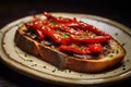 Red peppers with great anchovies on a slice of bread. Typical Spanish food