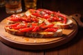 Red peppers with great anchovies on a slice of bread. Typical Spanish food