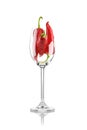 Red peppers in wine glass Royalty Free Stock Photo